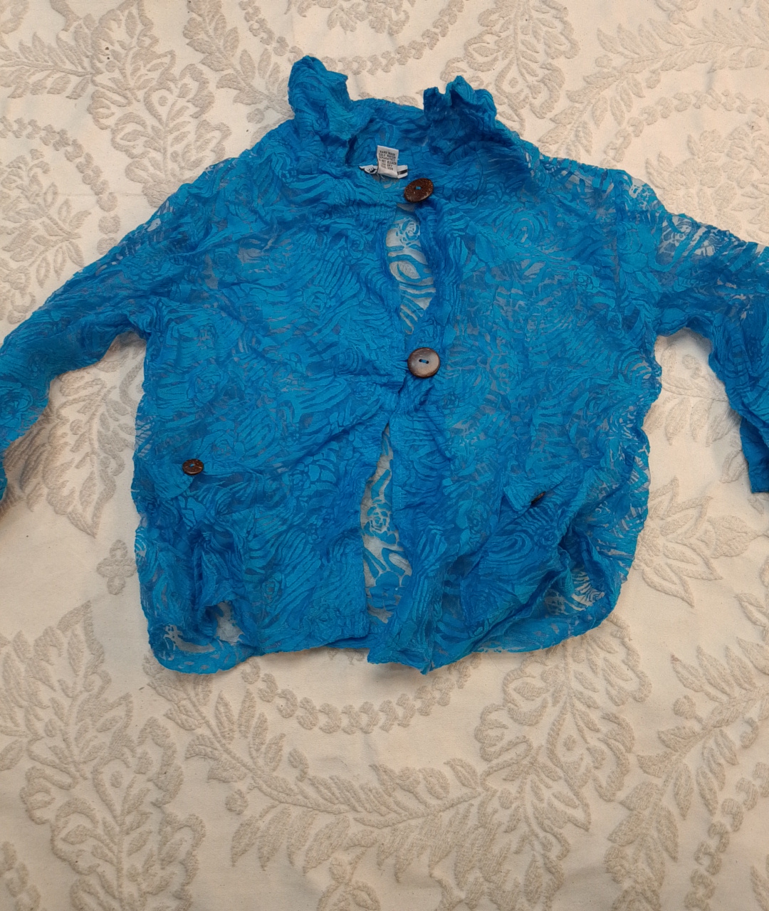 Veste en dentelle bleue