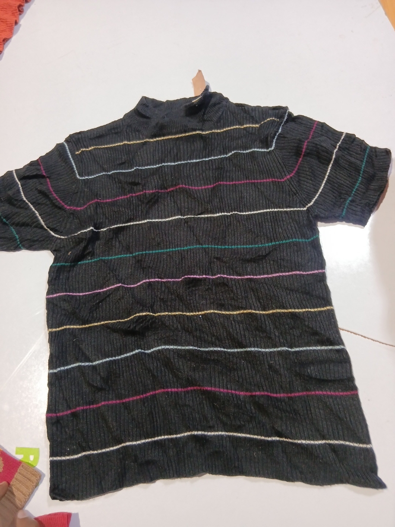 Túnica de cuello alto de manga corta a r..