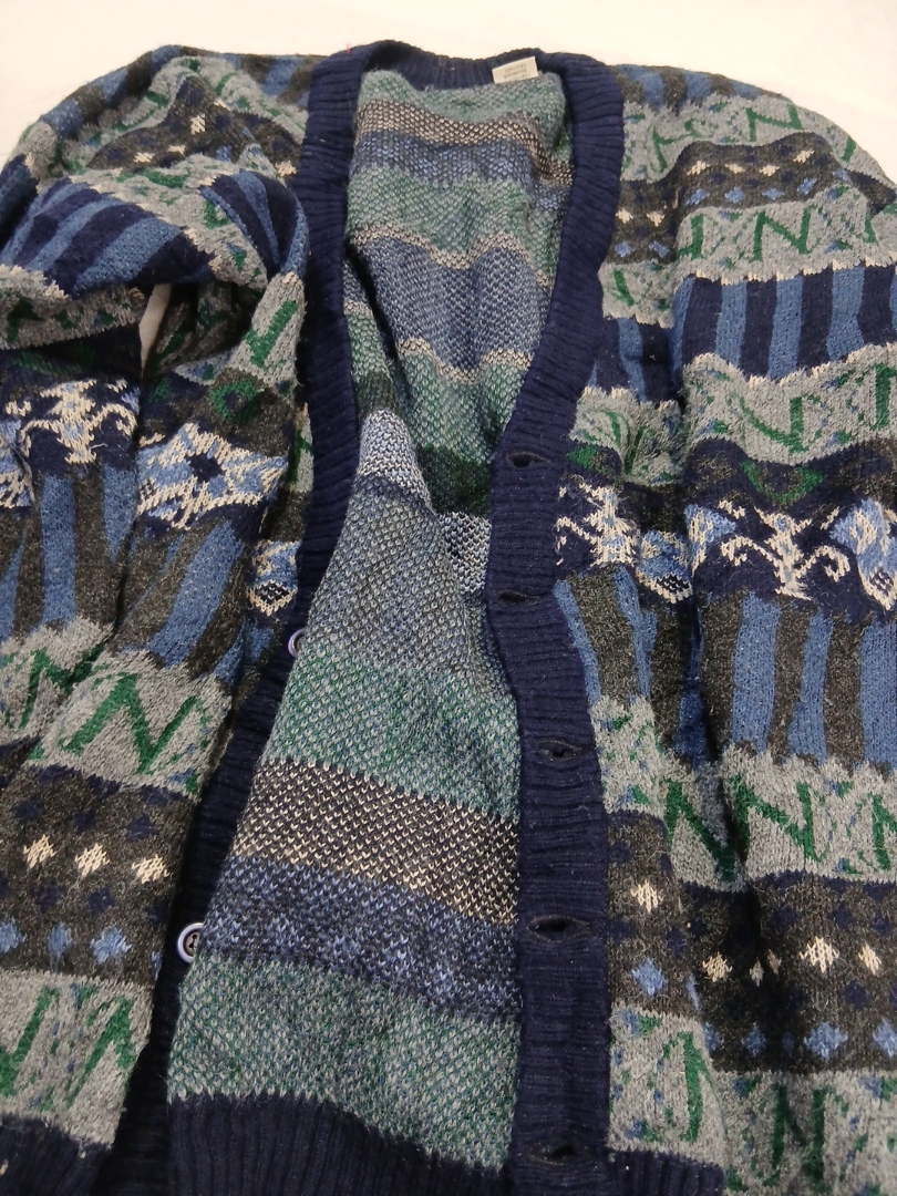 Hand-knit or machine-knit cardigan with unique pat..
