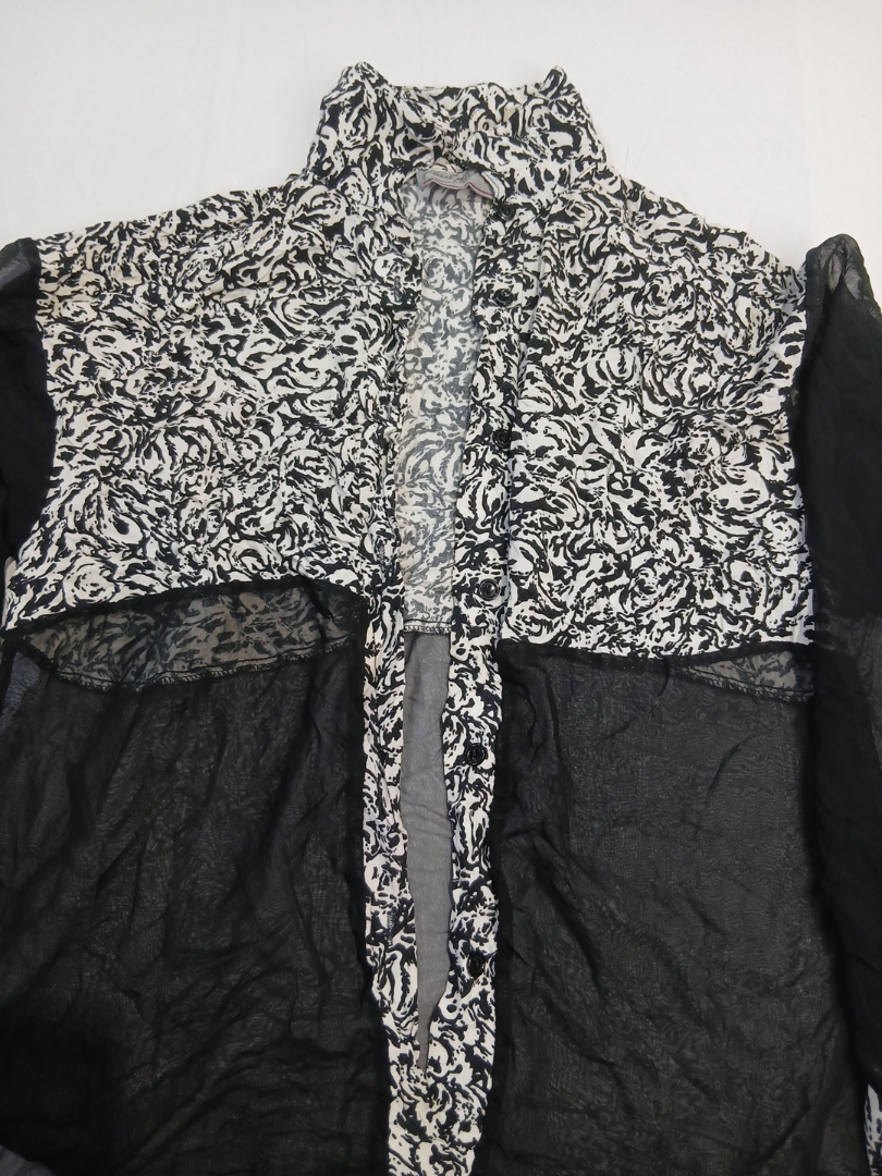 Veste noire et blanche Paul Russell