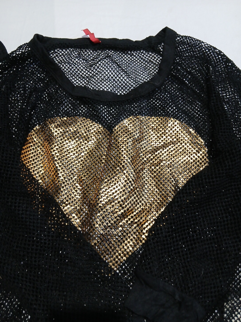 Blouse en mesh transparent avec cœur doré