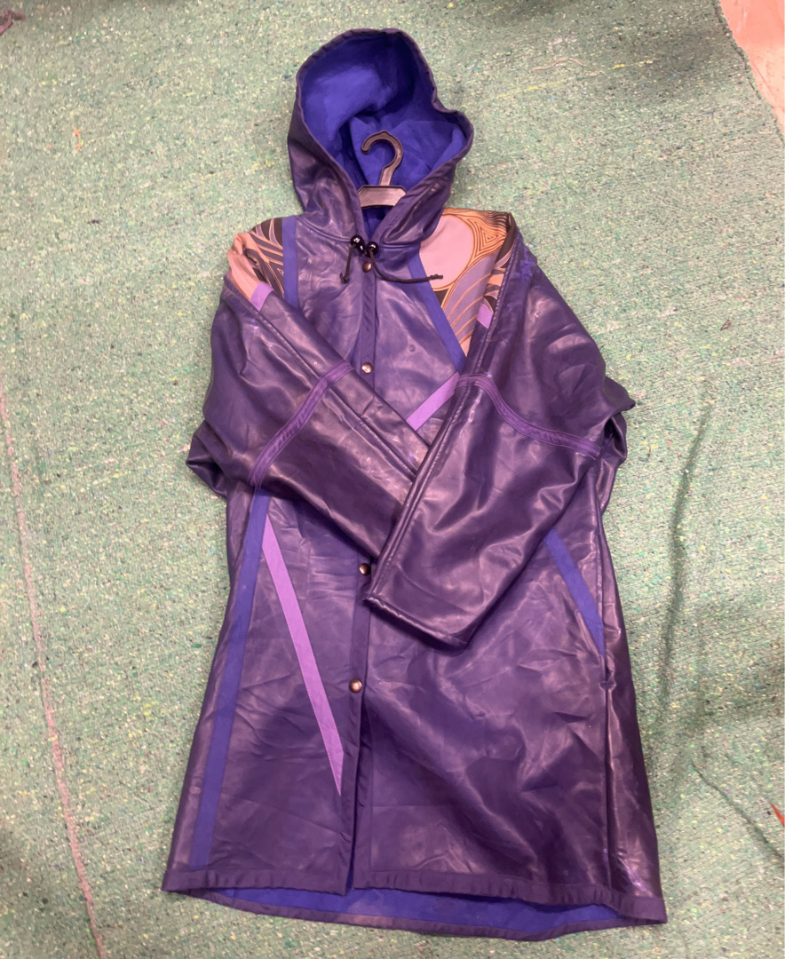 Lila Regenmantel