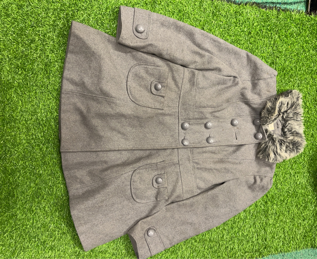 Manteau en fourrure grise