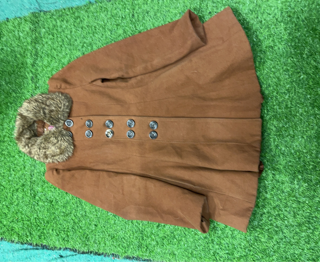 Veste en fourrure brune suivante