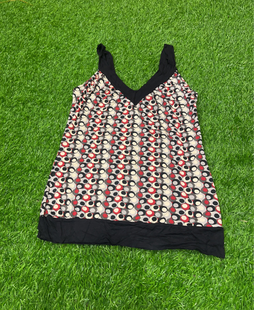 Blouse with Black Trim and Polka Dot Pattern