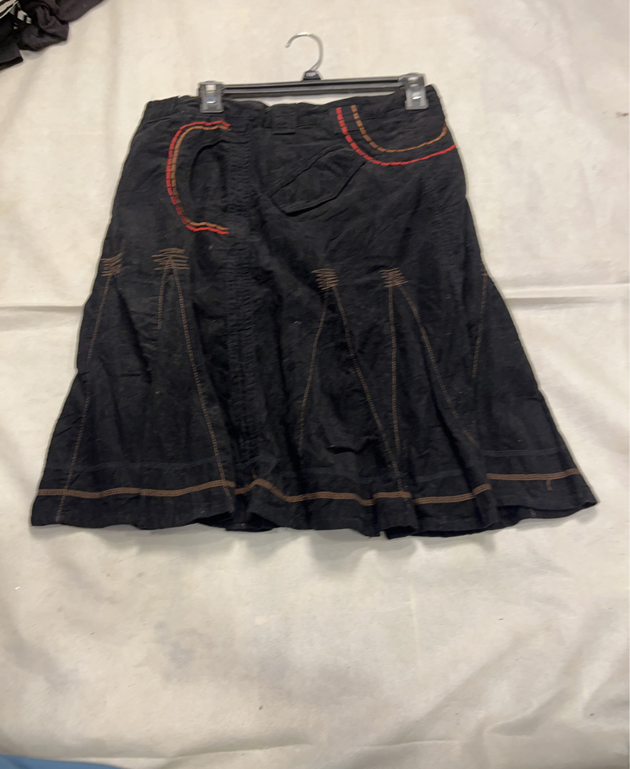 Black skirt with red and brown stitching