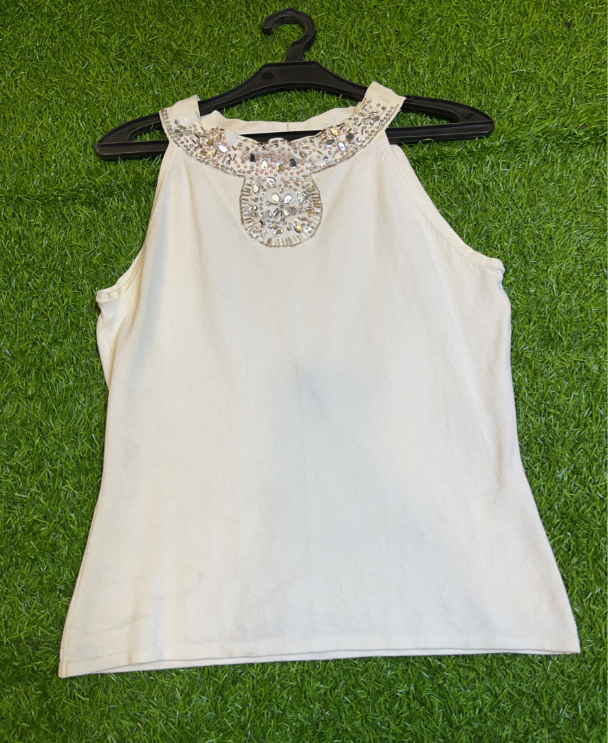 Top senza maniche bianco da donna