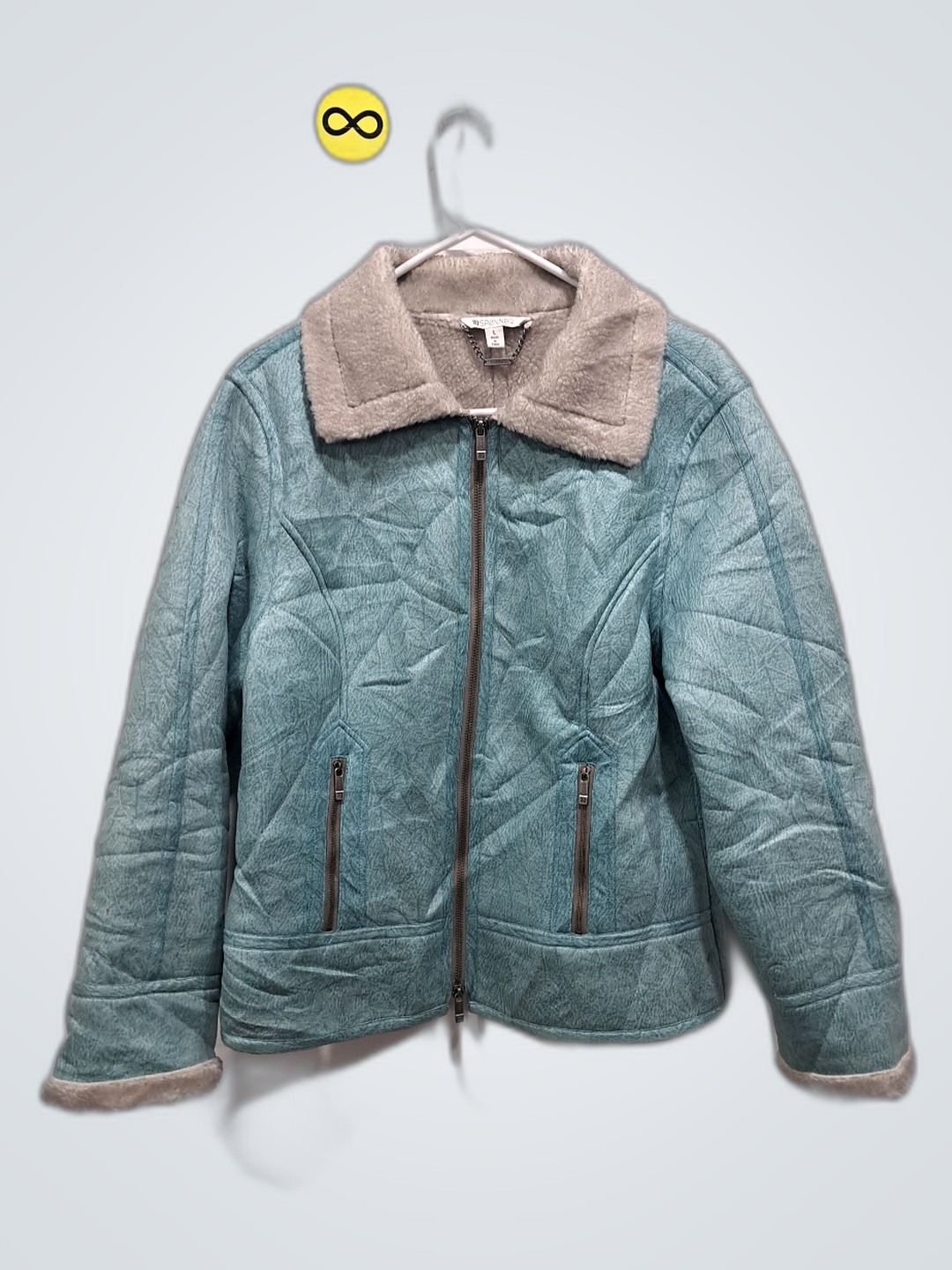 Türkise Steppjacke mit Kunstfellkragen