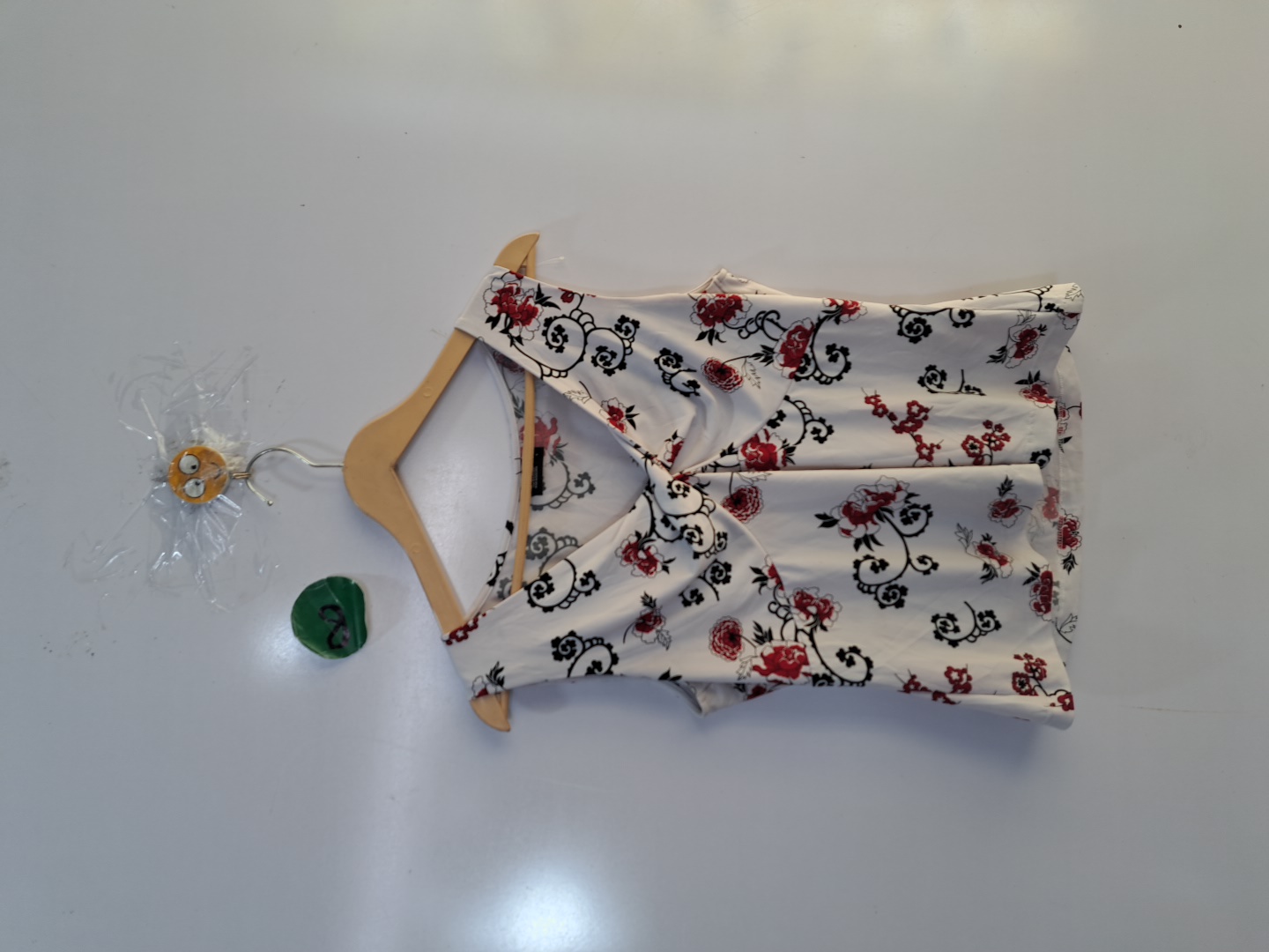 トライバルフローラルスリーブレストップ