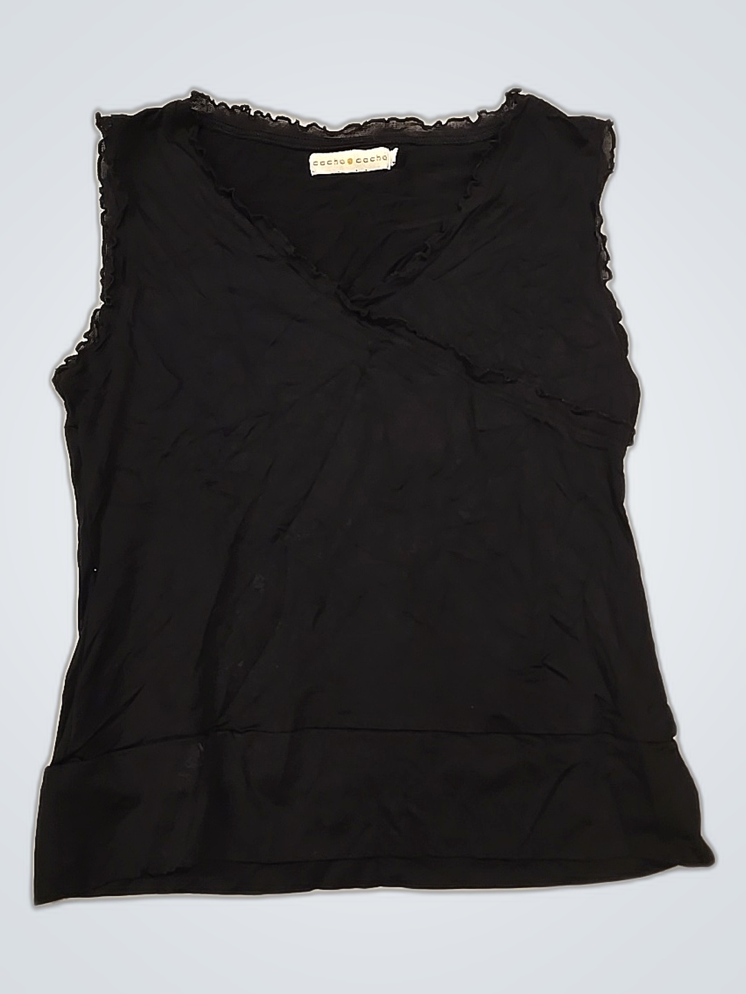 Blusa negra con volantes Cache Cache