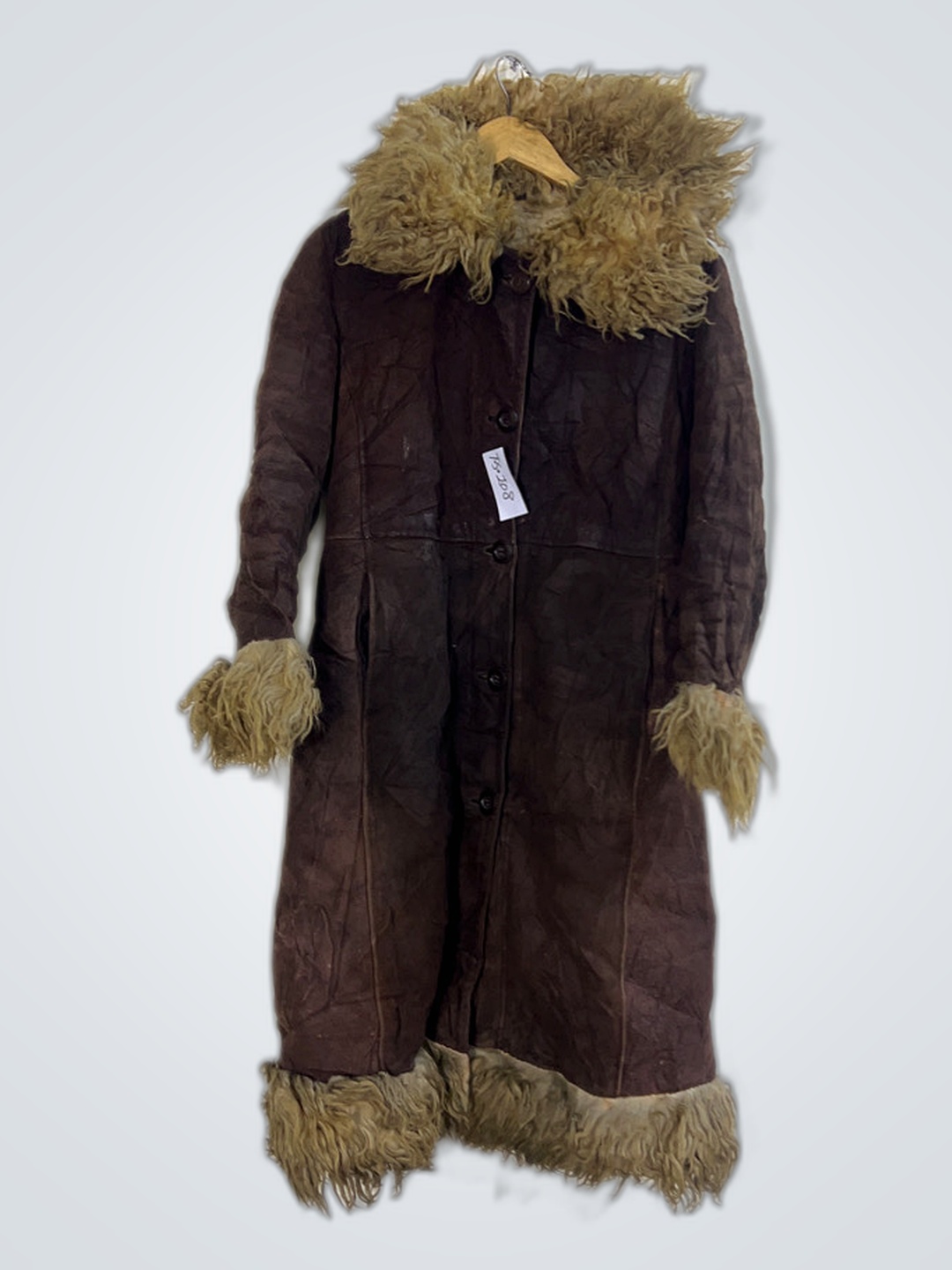 Manteau marron avec garniture en fourrure