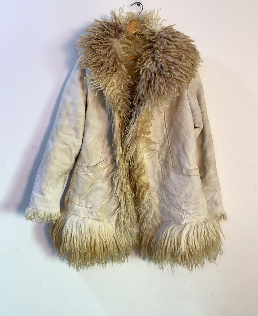 Manteau à bordure en fourrure