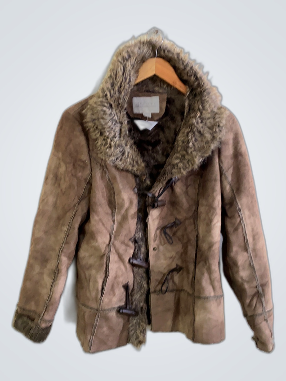 Veste en fourrure marron doublée