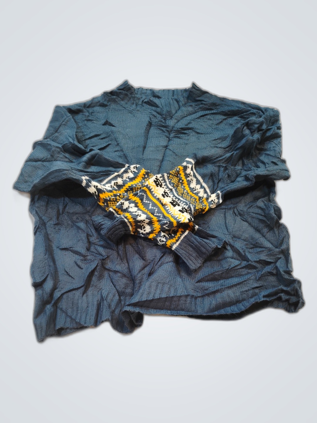 Blue sweater with patterned sleeves