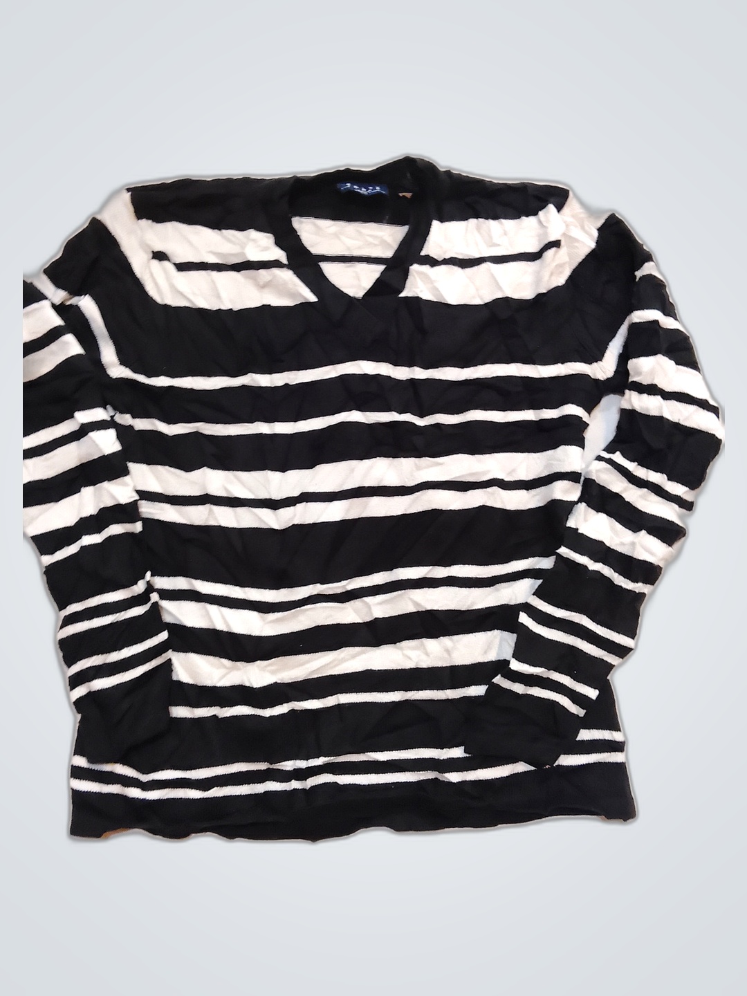 Schwarz-weißer gestreifter Langarmshirt