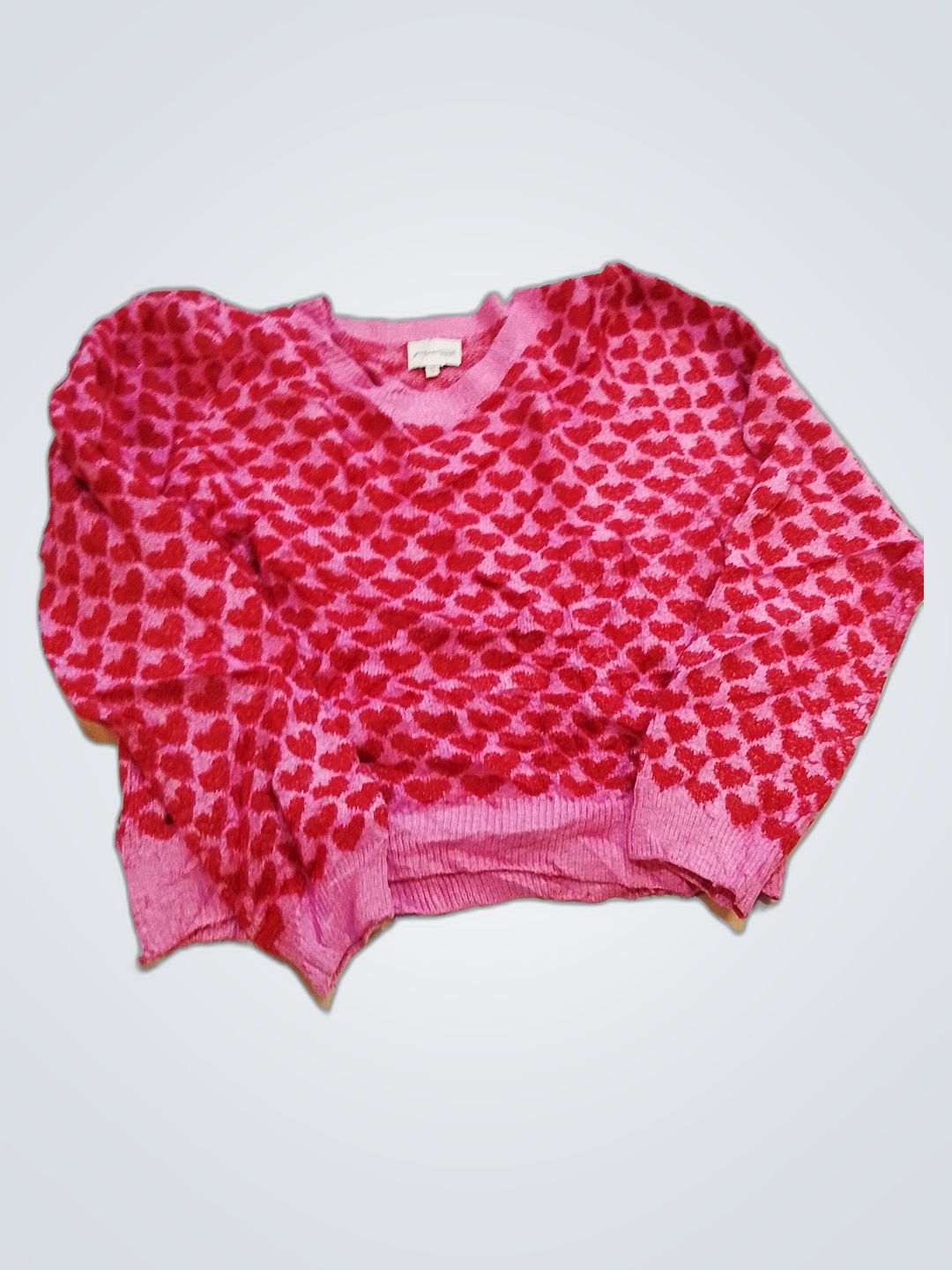 Pull à motif de cœurs roses